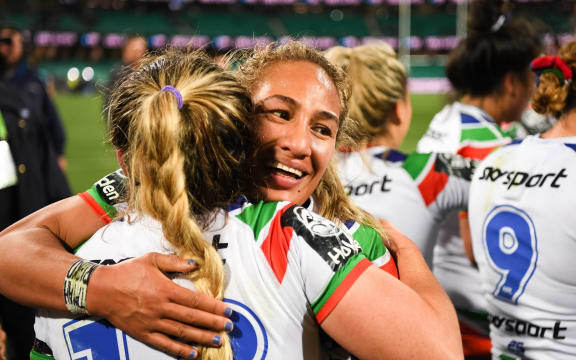 Warriors women celebrate win over Brisbane in NRLW.