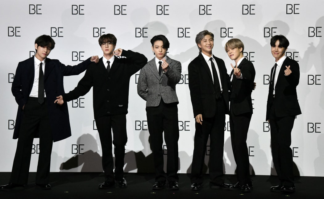 BTS members (L to R) V, Jin, Jung Kook, RM, Jimin and J-Hope pose for a photo session during a press conference on BTS new album 'BE (Deluxe Edition)' in Seoul on November 20, 2020.