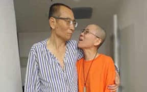 An undated photo of Nobel laureate Liu Xiaobo (left) with his wife Liu Xia at an unidentifiable hospital in Shenyang, China.