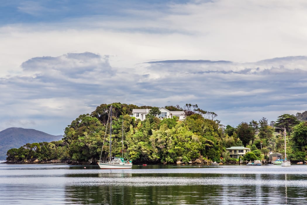 Stewart Island aka Rakiura, the third largest island in the country. Oban, view across,Golden Bay.