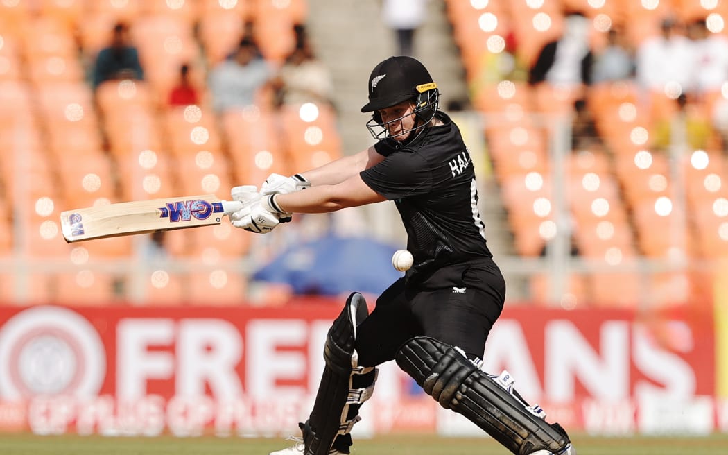 Brooke Halliday hits out during the White Ferns innings against India in the third ODI match of their series in Ahmedabad.