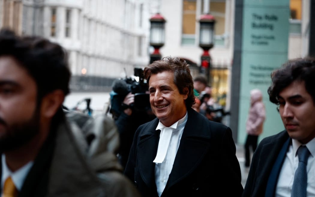 Barristers David Sherborne, centre, representing Britain's Prince Harry, Duke of Sussex, leaves the Royal Courts of Justice, Britain's High Court, in central London on 21 January 2025.