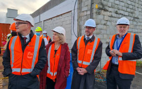 Health Minister Andrew Little (second right) at the construction site of Dunedin's new hospital.