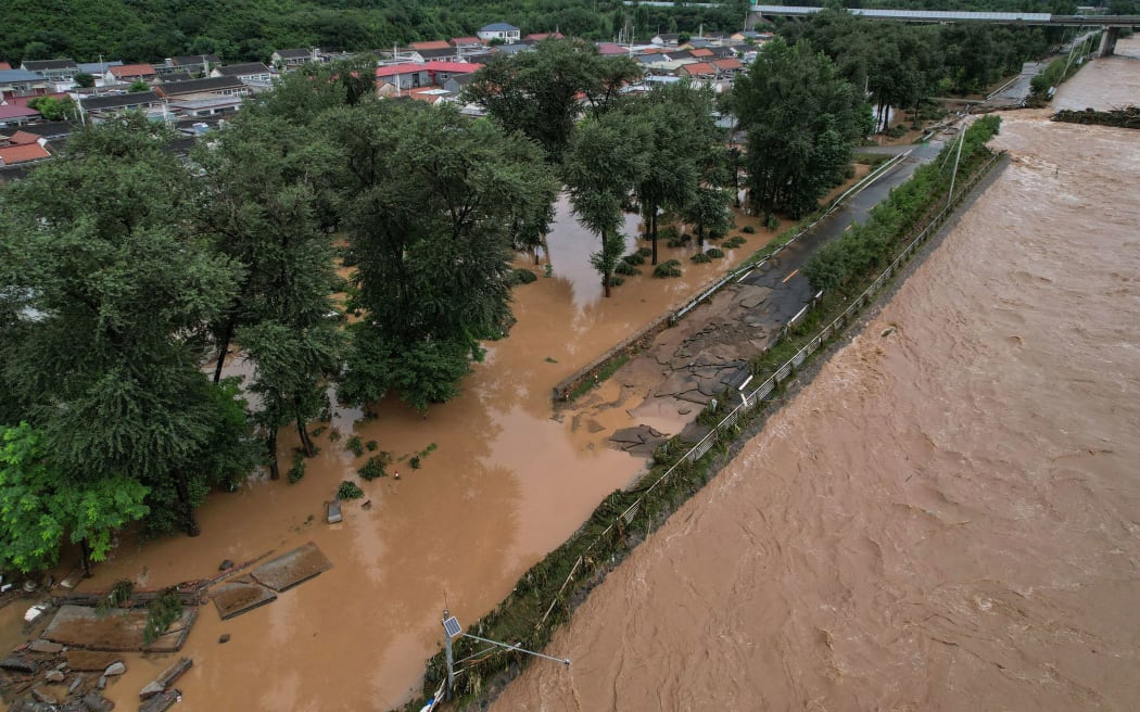 Flooding in Miyun district, on the outskirts of Beijing, on 28 July.