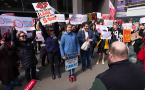 Secondary School teachers protest down Wellington's CBD to Grant Robertson's office.