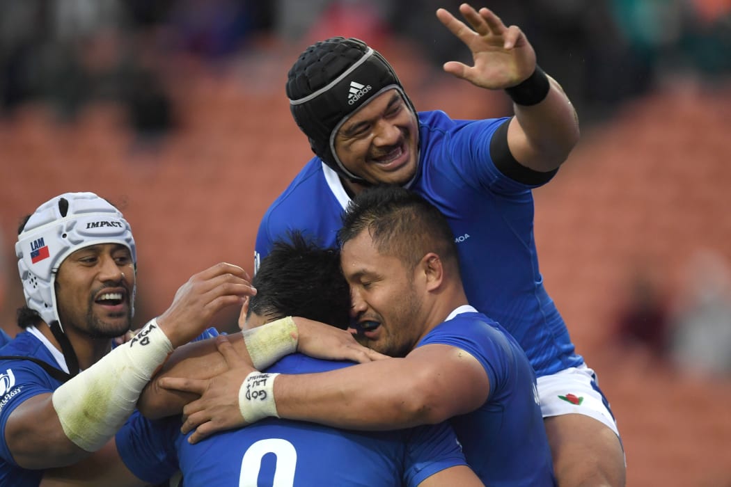 Samoa celebrate a try against Tonga.