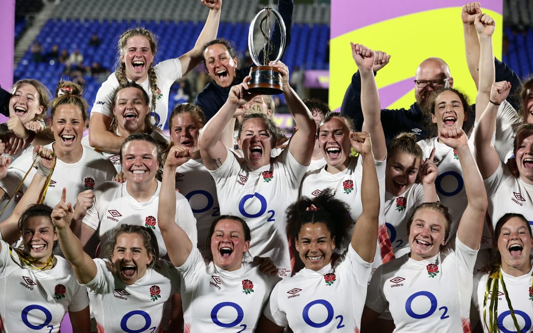 Captain Marlie Packer of England celebrates with the WXV1 trophy