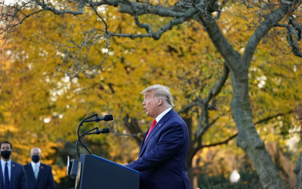 US President Donald Trump delivers an update on "Operation Warp Speed" in the Rose Garden of the White House in Washington, DC on November 13, 2020. (Photo by MANDEL NGAN / AFP)