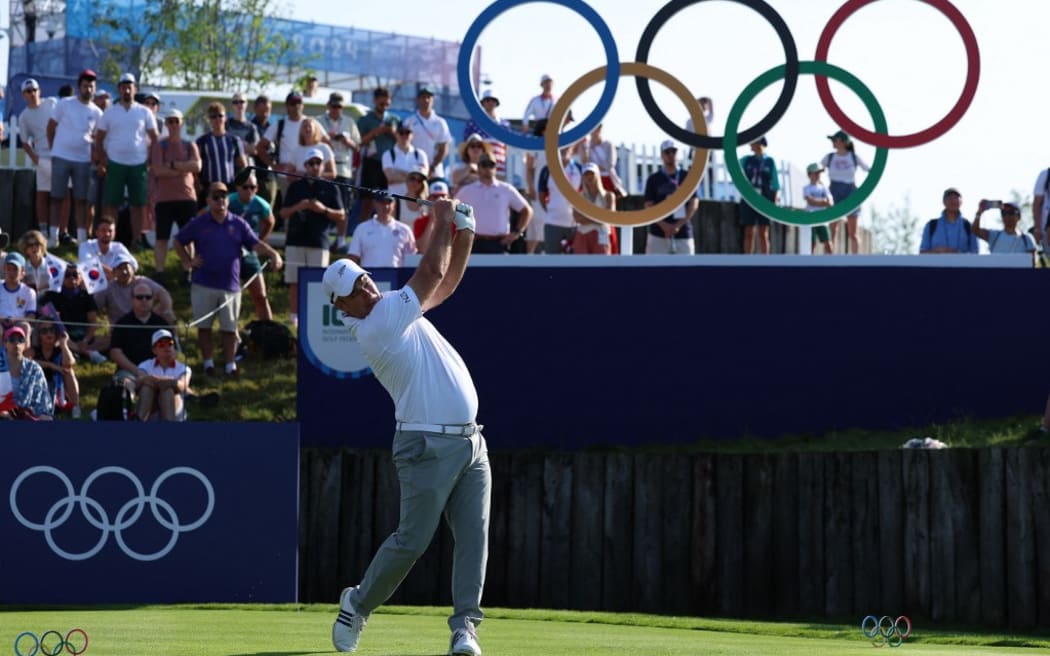 New Zealand's Ryan Fox competes in round 1 of the men's golf individual stroke play of the Paris 2024 Olympic Games at Le Golf National in Guyancourt, south-west of Paris on August 1, 2024. (Photo by Emmanuel DUNAND / AFP)