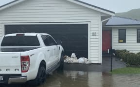 Sandbagged house at Sponge Bay, Gisborne