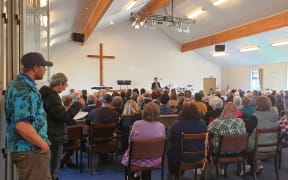 More than 200 people gathered for the community meeting.