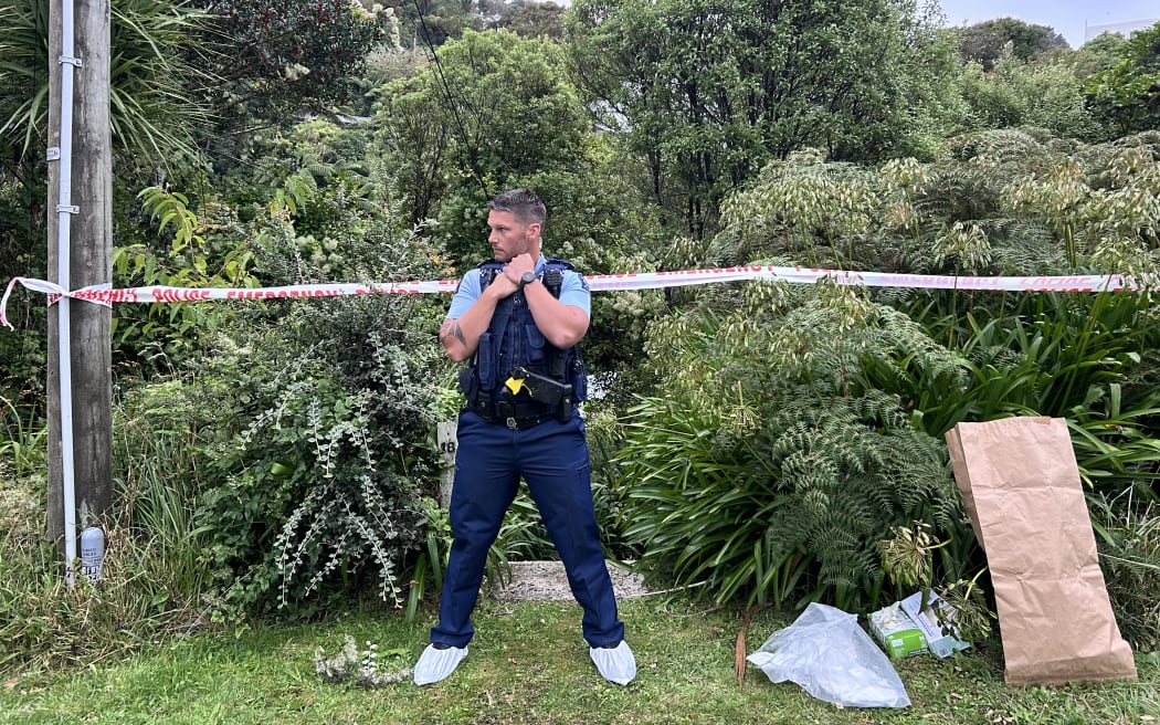 Wellington police at the scene in Albemarle Road, Northland, where a man was found dead outside a property on Tuesday 1 April 2025.