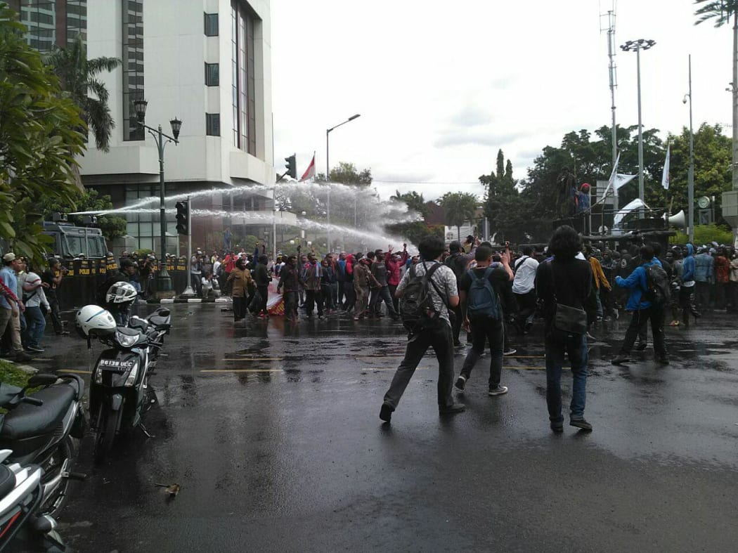 Indonesian police turn water canons on protestors who were mostly university students from Free Papua Organization and the Papua Student Alliance in Jakarta on December 1, 2016.