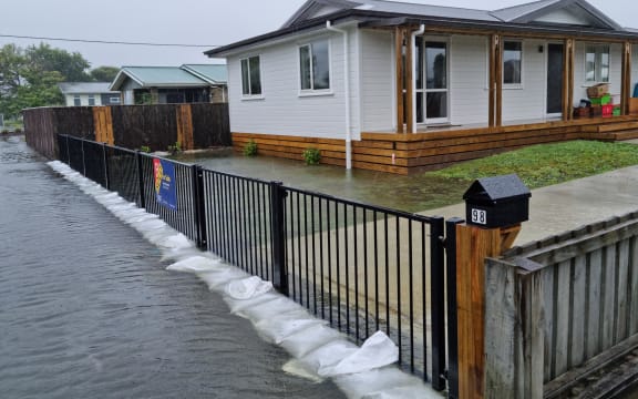 Sandbags stacked up at Derby Street, where residents prepare to evacuate as heavy rainfall threatens to flood the area.