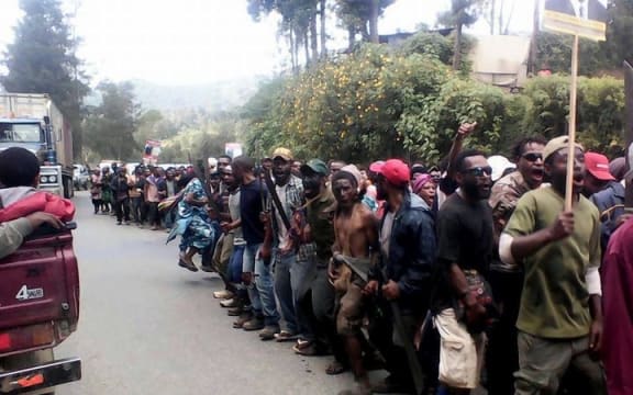 Supporters of election candidate Alfred Manase take to the streets in Wabag town, as violence erupts in Enga's provincial capital, 22 July 2017.