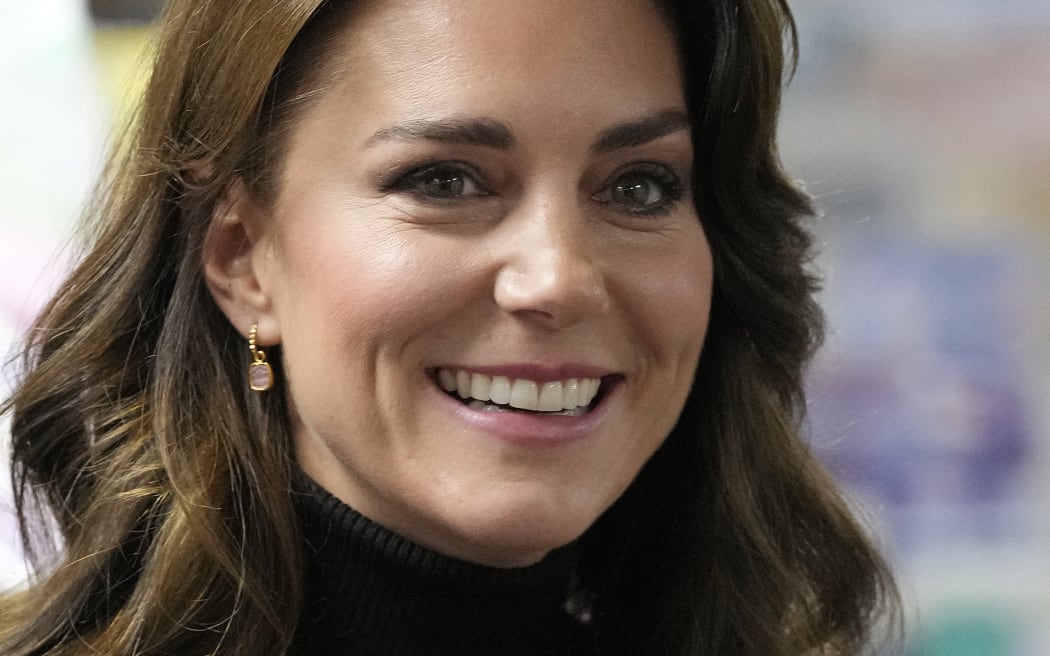 Britain's Catherine, Princess of Wales reacts during a visit to Sebby's Corner in north London on November 24, 2023, where she helped with the charity's annual Christmas Grotto preparations. Sebby's Corner was formed in January 2021 and provides items to families in need across Barnet, Hertfordshire and London, and since opening, has supported over 5,000 families, seeing a year on year increase in referrals to the baby bank. (Photo by Frank Augstein / POOL / AFP)