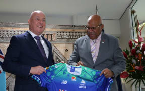 New Zealand Prime Minister Christopher Luxon and Fiji Prime Minister Sitiveni Rabuka have met ahead of their bilateral. Rabuka gave Luxon, a Crusaders fan, a Fijian Drua shirt which Luxon took in his stride. Luxon gifted Rabuka with a Hoehner harmonica, one of only three in New Zealand.