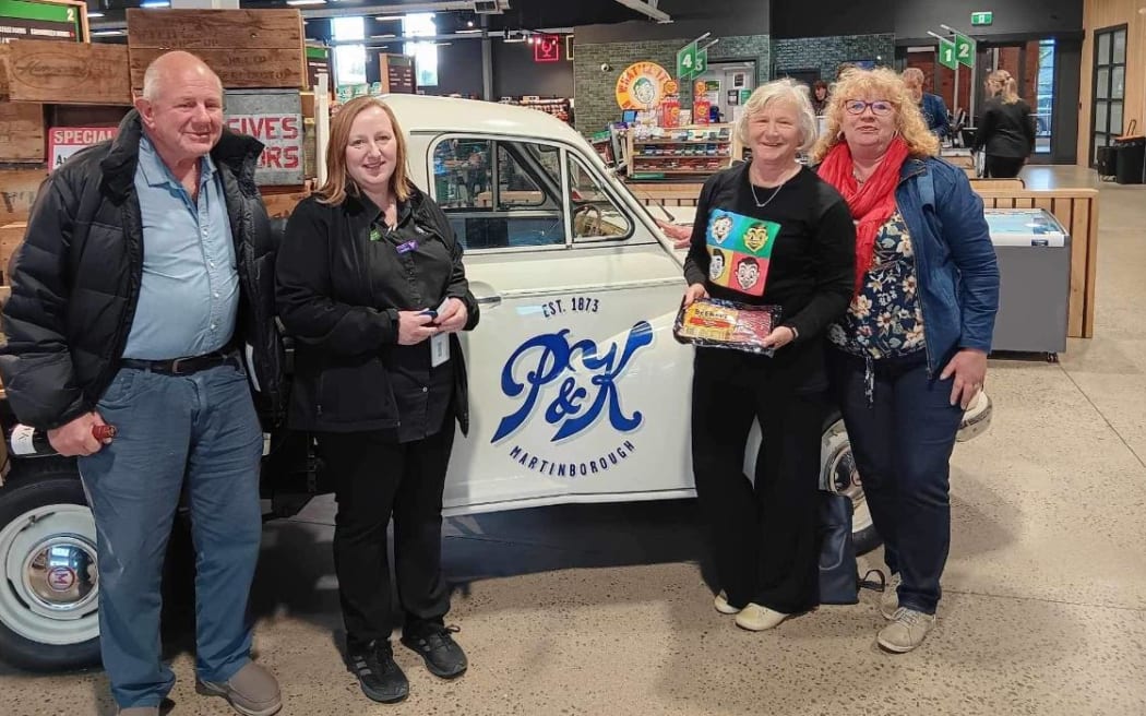 Louise Wynn (centre right) celebrating having visited all 225 of New Zealand's Four Square stalls, at her local store in Fairlie, Canterbury, on 4 July, 2024.