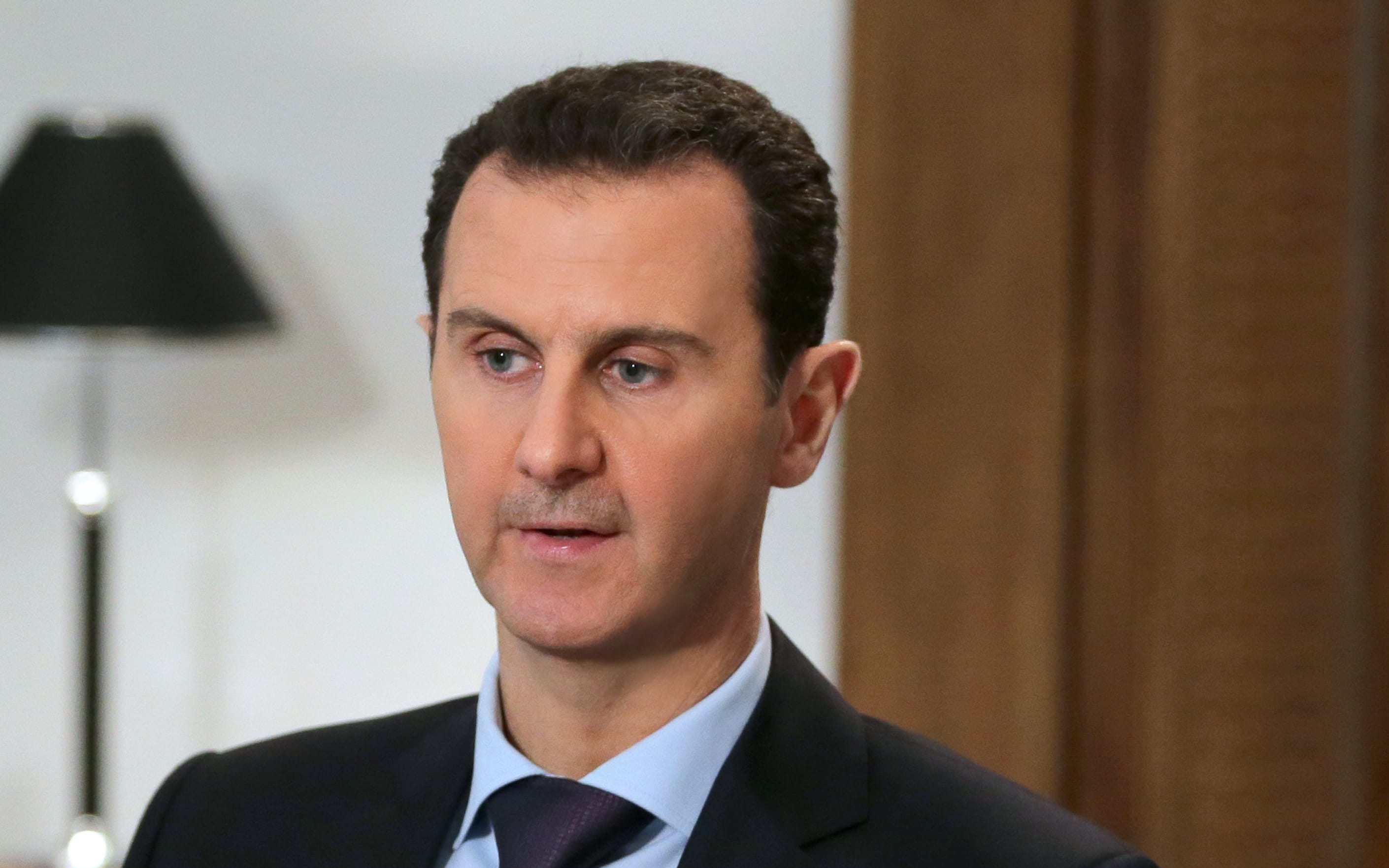 Syrian President Bashar al-Assad in an exclusive interview with AFP in the capital Damascus 11 February 2016.