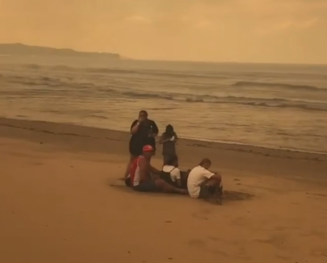 Tathra residents huddled on the beach to escape the destructive bushfire