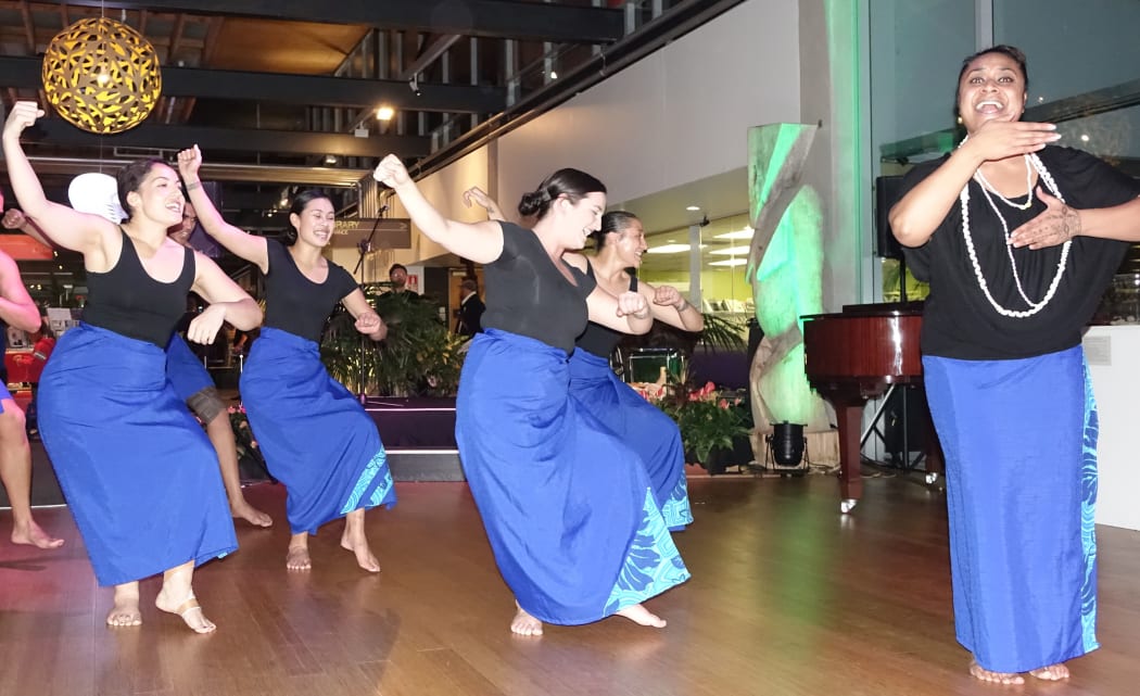 Tupe Lualua (R) leads a performance by Le Moana.