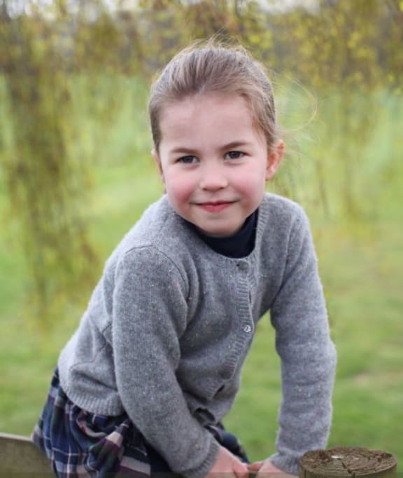 Two photographs were taken at Anmer Hall, on the Queen's Sandringham Estate in Norfolk.