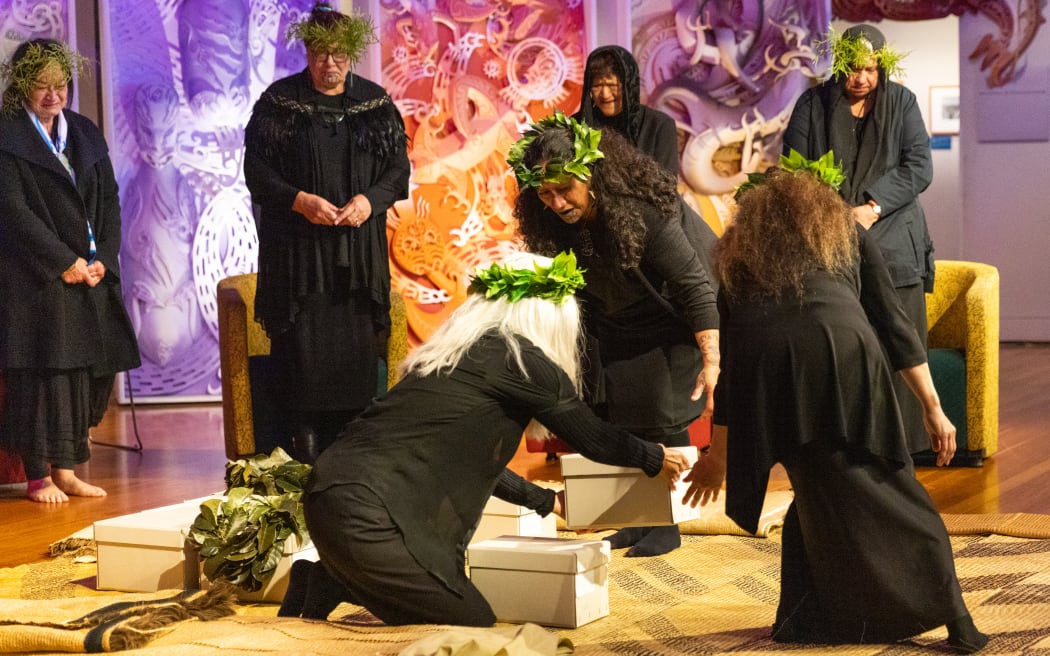 Tūpuna and karāpuna (ancestors) are placed on to Te Atamira (stage) and covered with kākahu (traditional cloaks).