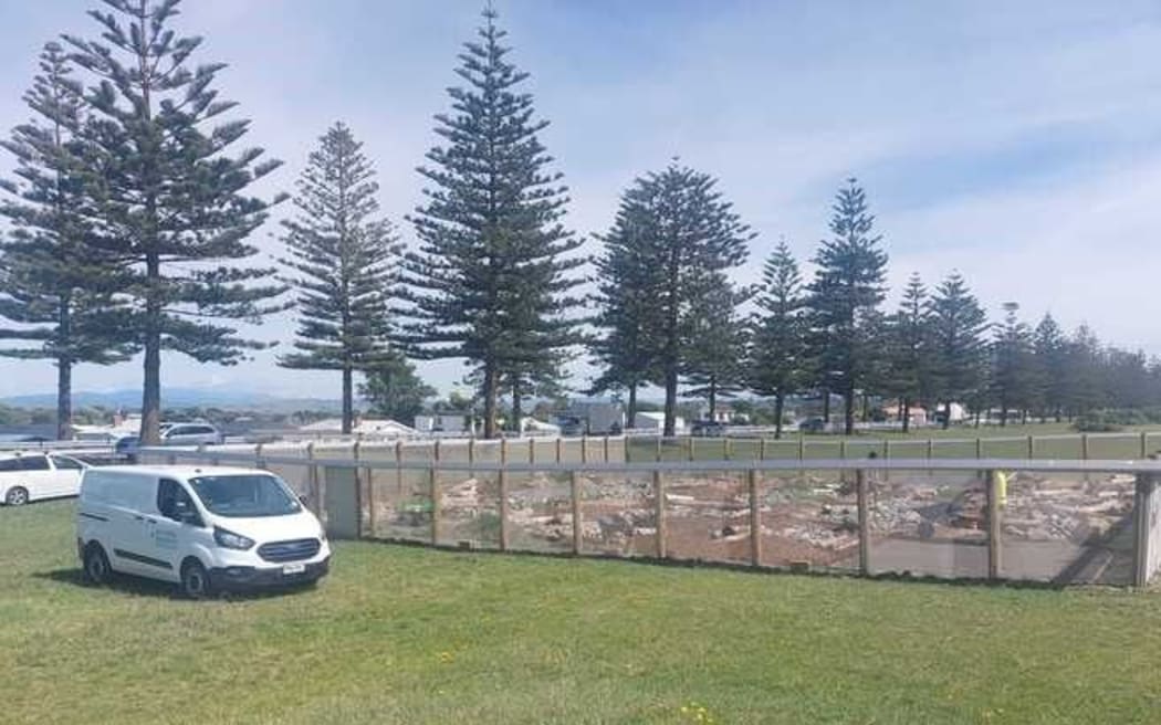Napier City Council staff work on the predator-proof enclosure on Marine Parade for the relocation of a colony of native kōkōwai/northern spotted skinks. Photo / Linda Hall