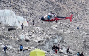 April 18, 2014: A Nepalese rescue helicopter lands at Everest Base Camp during rescue efforts following an avalanche that killed 16 Nepalese sherpas in the Khumbu icefall at the base of Mount Everest.