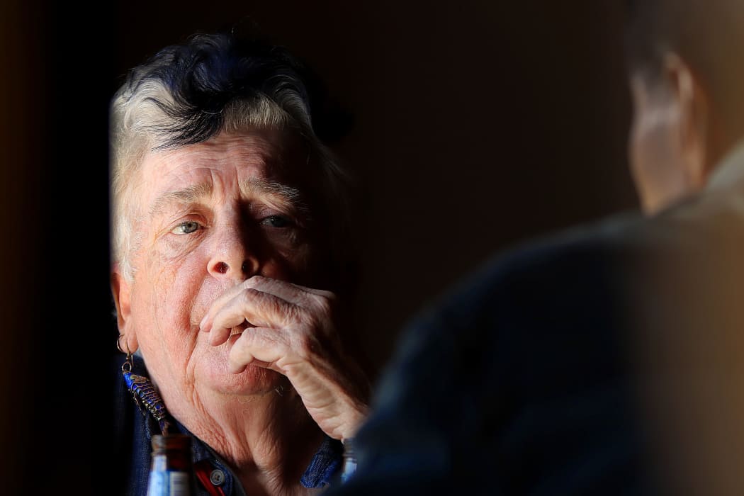 elderly woman in conversation