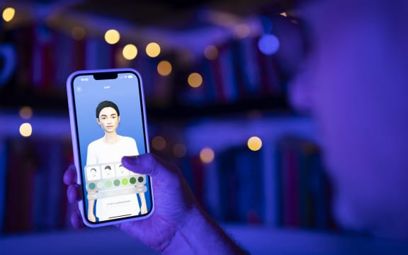 This illustration photo shows a user interacting with a smartphone app to customize an avatar for a personal artificial intelligence chatbot, known as a Replika in Warsaw, Poland on 22 July, 2023.