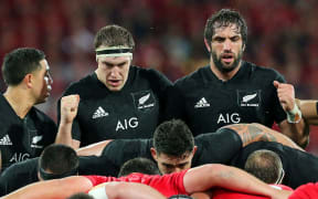 Brodie Retallick and Sam Whitelock prepare to pack down in a scrum against the British and Irish Lions.