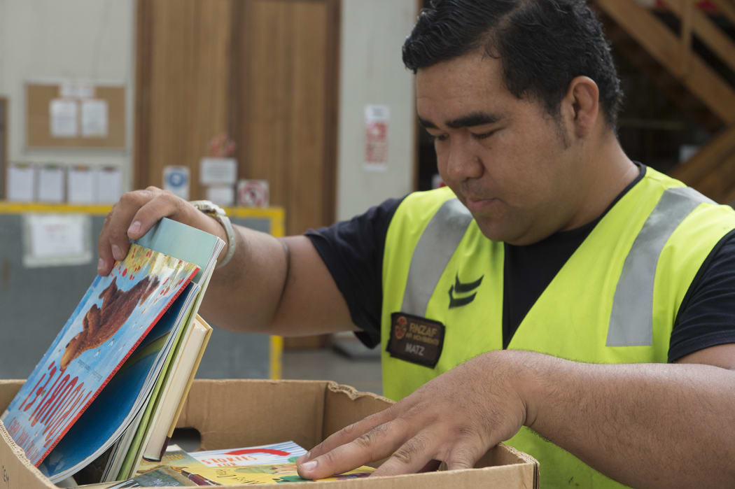 Books being packed by RNZAF for PNG