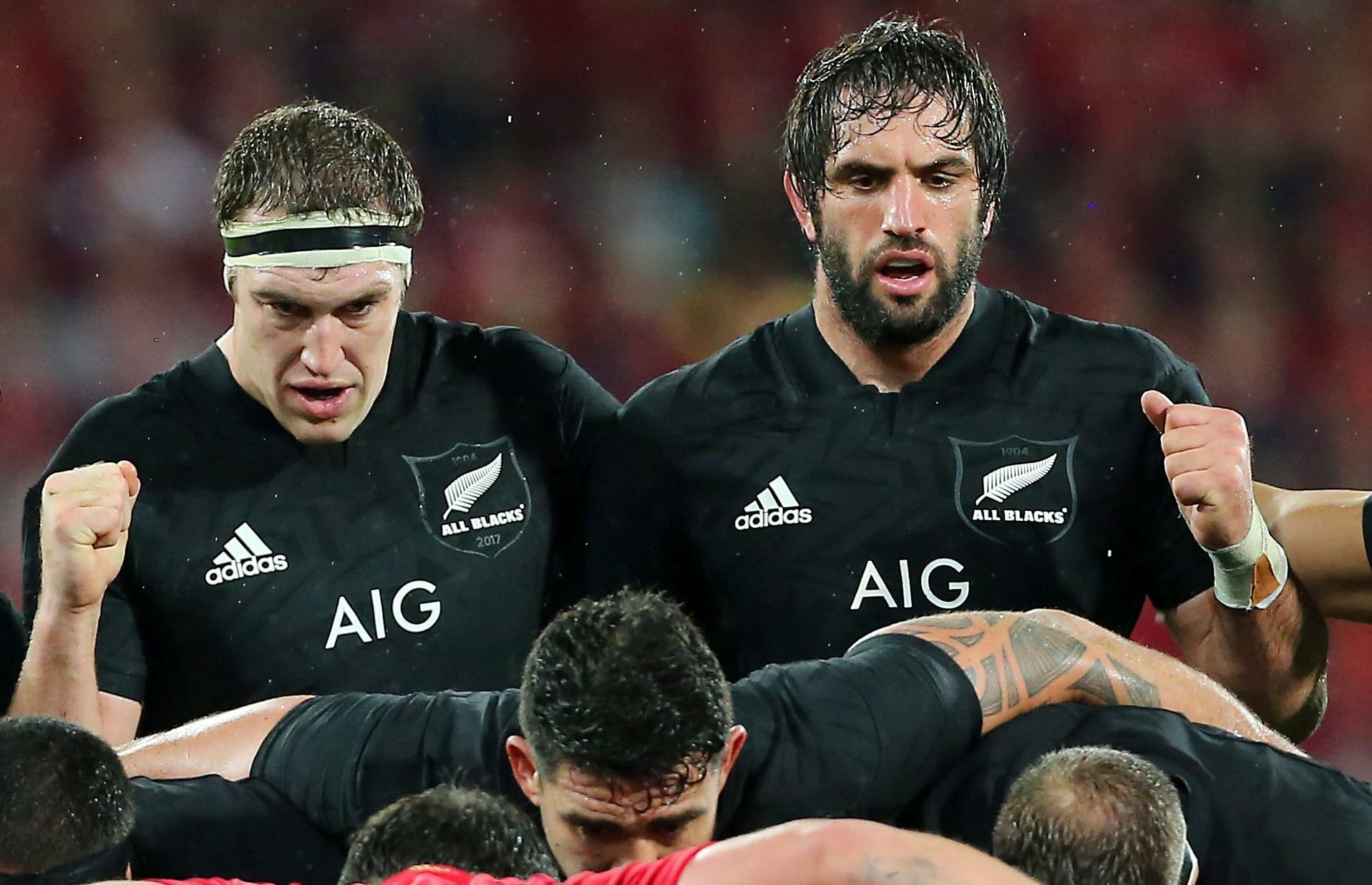 Brodie Retallick and Sam Whitelock prepare to pack down in a scrum against the British and Irish Lions.
