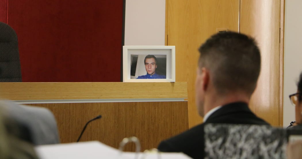 A framed photo of Nick Evans, who's the subject of the coronial inquest.