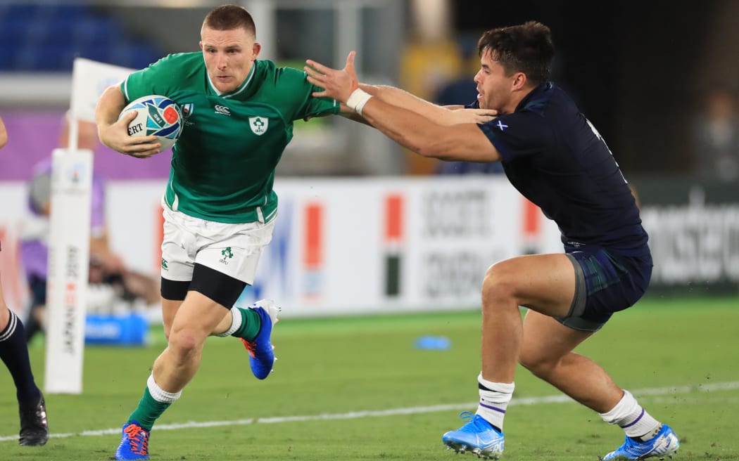 Ireland's Andrew Conway struggles to keep a ball during the first half of the Pool A match against Scotland in the 2019 Rugby World Cup Japan at International Stadium Yokohama in Yokohama.