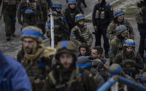 Ukrainian soldiers patrol at the streets of Izium city after Russian Forces withdrawal as Russia-Ukraine war continues in, Kharkiv Oblast, Ukraine on September 14, 2022.