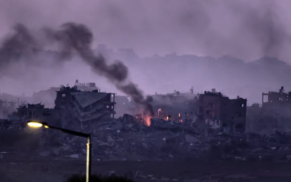 Smoke billows during the Israeli military bombardment of the northern Gaza Strip on 14 November, 2023, amid the ongoing battles between Israel and the Palestinian group Hamas. More than 11,000 people have been killed in relentless Israeli bombardment of the Gaza Strip, according to the Hamas-run health ministry, since the war erupted after Palestinian militants raided southern Israel on 7 October killing at least 1200 people, according to official Israeli figures.