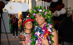 WMBA star Te-Hina Paopao celebrates being drafted with her family.