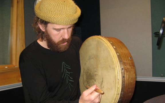 Chris O'Connor playing a bodhran