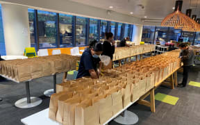 Meal packs being prepared at the Auckland City Mission.