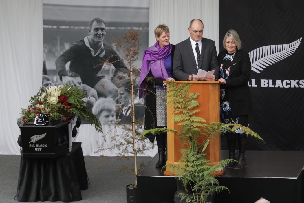 David Lochore gives a speech at his father's funeral.