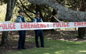 Police guard the scene at Mona Ave in Mangere Bridge where the baby's body was found.
