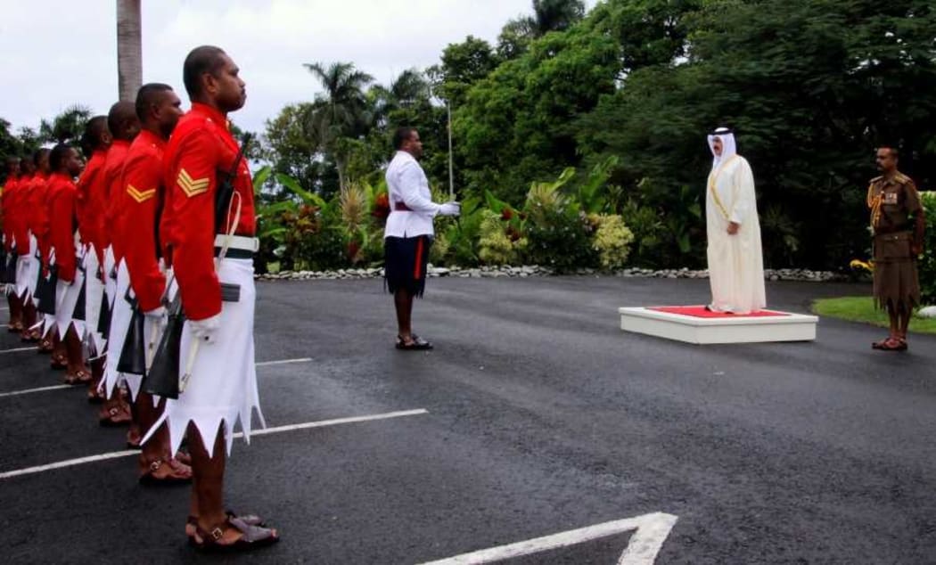 Ambassador Al Khalifa inspects a Fiji guard of honour.