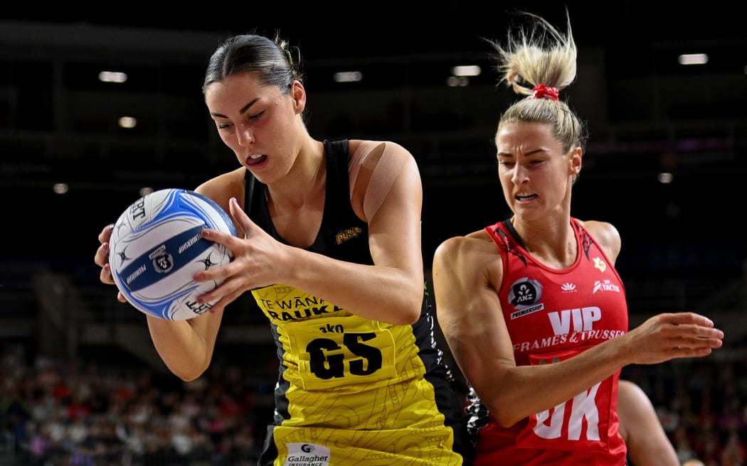 Amelia Walmsley of the Central Pulse and Jane Watson of the Tactix tussle for the ball during the ANZ Premiership Netball match, Tactix Vs Pulse, at Wolfbrook Arena, Christchurch, New Zealand, 15th June 2025. Copyright photo: John Davidson / www.photosport.nz