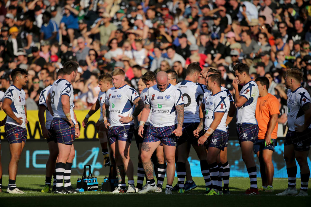 Dejected looking Scotland team after losing to the Kiwis