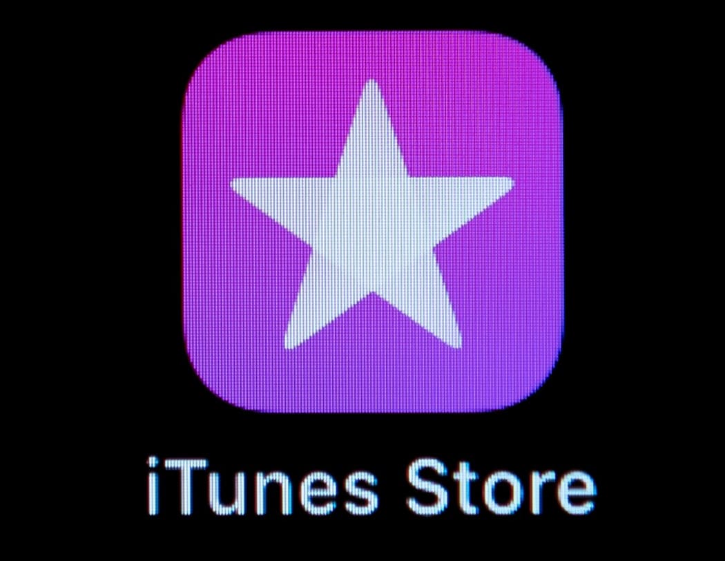 09 April 2019, Hessen, Rüsselsheim: ILLUSTRATION - The iTunes Store icon (Application software) is visible on the screen of an iPhone. Photo: Silas Stein/dpa