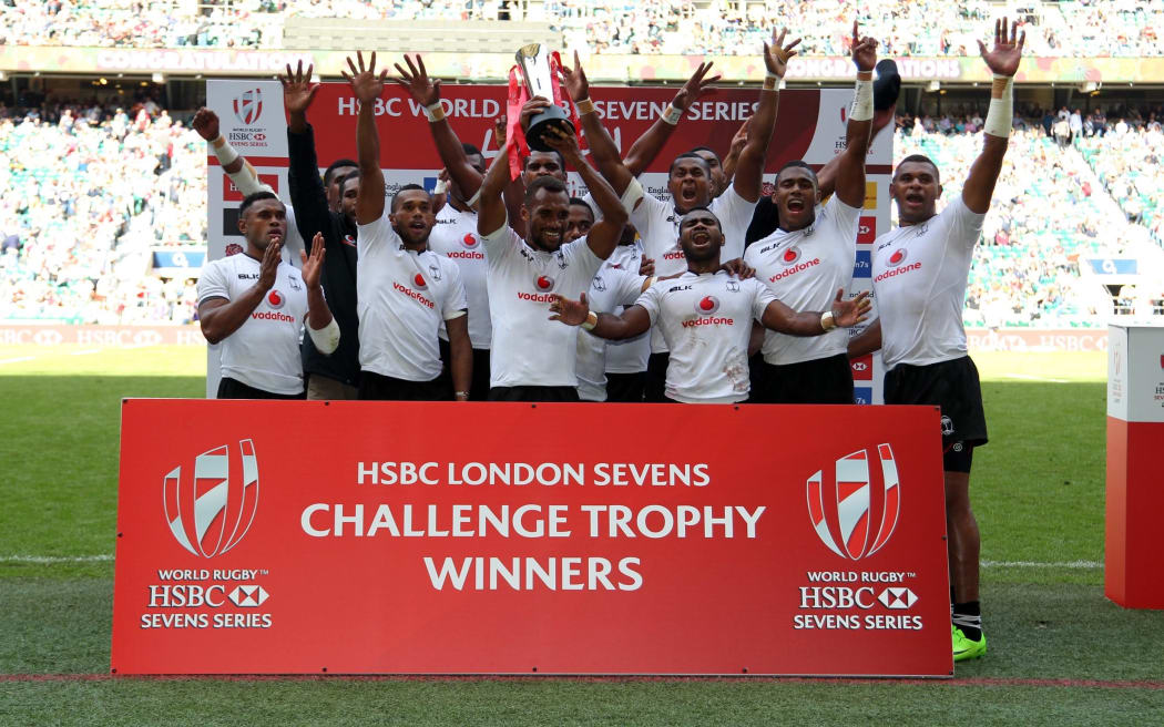 Fiji celebrate winning the Challenge Trophy title in London.