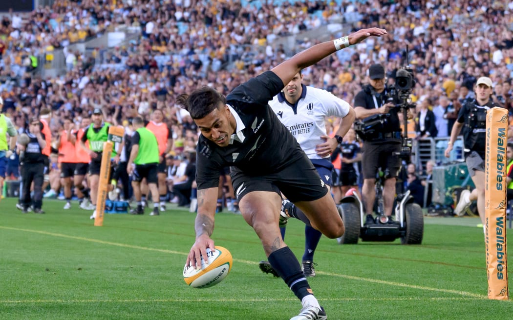 Reiko Ioane scores against the Wallabies.