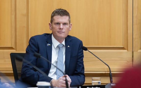 National MP Tim Costley listens to evidence in the Foreign Affairs Committee.